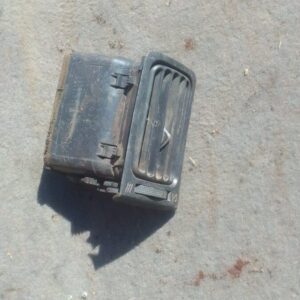 Left dash air vent for Toyota Runx, angled front view, used condition.Left dash air vent for Toyota Runx, angl