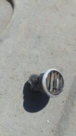 Close-up of a used Audi A3 dashboard air vent showing the grille and trim from front angle.Close-up of a used
