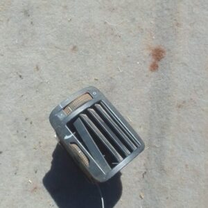 Left side dashboard air vent for Volkswagen Passat, used, shown from the front angle.Left side dashboard air v