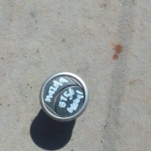 Front-facing view of a used Mazda BT50 dashboard air vent panel with integrated controls.Front-facing view of