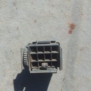 Right side dashboard air vent for Volkswagen Caddy, shown close-up, used condition visible.Right side dashboar