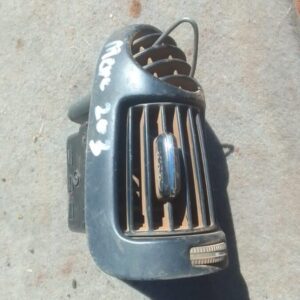 Front view of a used Mercedes W203 dashboard air vent panel with three round vents and control knobs.Front vie