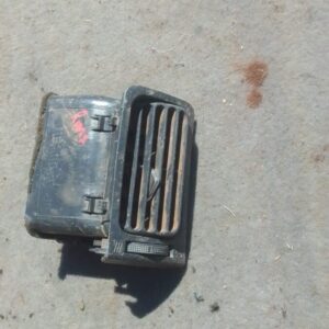 Right side dashboard air vent for Toyota Runx shown from front angle, used condition.Right side dashboard air
