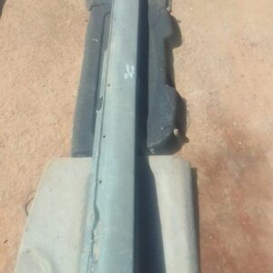 Right side skirt for 2002 Volvo S80 shown from side angle, used condition with minor wear visible.Right side s