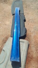 Left side skirt for a BMW E82 120i, shown from the side, used condition.Left side skirt for a BMW E82 120i, sh