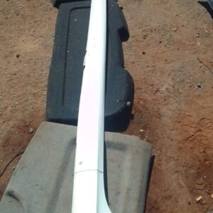 Left side skirt for Volkswagen Golf 5, shown used, displayed from side angle on white background.Left side ski