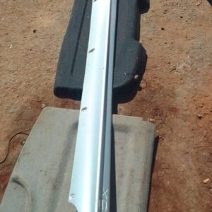 Left side skirt for Volvo XC60, used condition, shown angled from the side against a plain background.Left sid