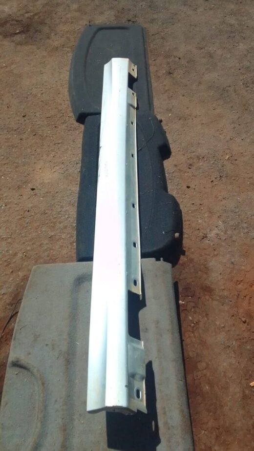 2013 Mercedes W204 Left Side Skirt - Used Left side skirt for Mercedes W204 shown from an angle, used condition visible in the image.Left side skirt for