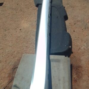 Right side skirt for Alfa Romeo Giulietta, used condition, shown from a side angle.Right side skirt for Alfa R