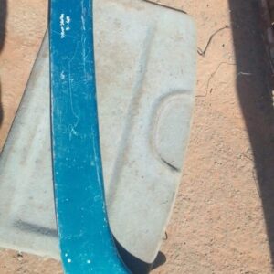 Rear view of a used Nissan Sentra boot spoiler positioned on the trunk lid, showing surface details.Rear view
