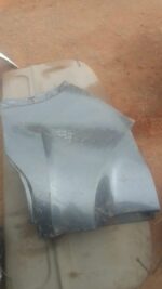 Used left rear bumper corner for Honda Civic shown from an angled rear perspective on a white background.Used