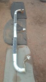 Left side step for Mazda Drifter, visible from the side, in used condition.Left side step for Mazda Drifter, v