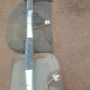 Left side step for Mazda Drifter, visible from the side, in used condition.Left side step for Mazda Drifter, v