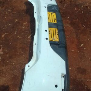 Rear view of a used Renault Sandero bumper showing mounting points and surface condition.Rear view of a used R