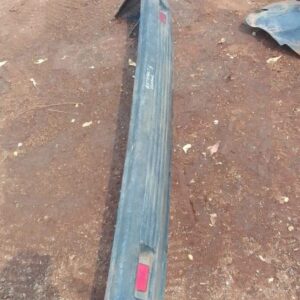 Rear bumper for Renault 5 shown from an angled front view, used condition with some wear visible.Rear bumper f