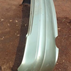 Rear bumper for Daewoo Nubira shown straight on, used condition with minor surface marks.Rear bumper for Daewo
