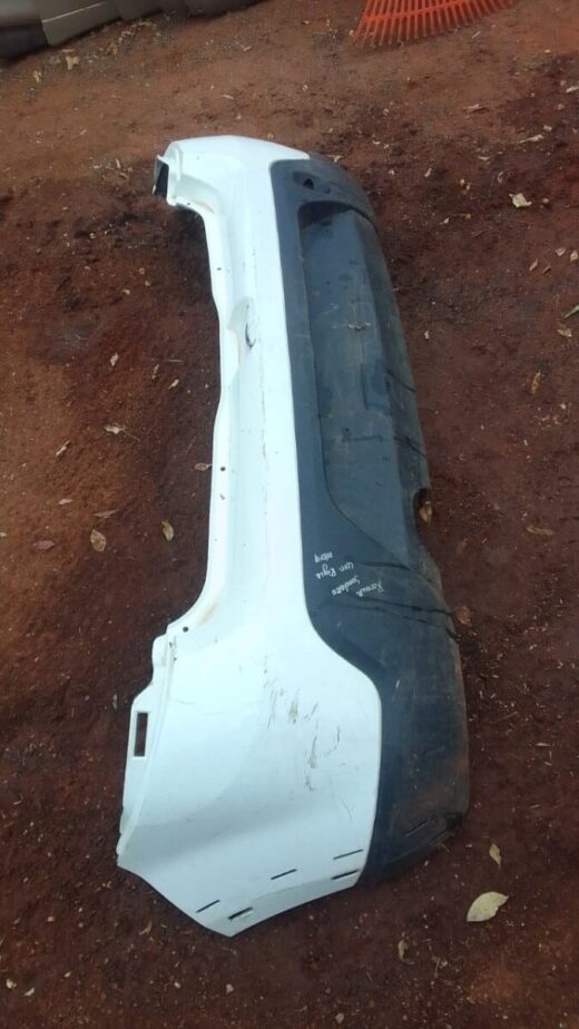 2013 Renault Sandero Rear Bumper - Used Rear used bumper of a 2013 Renault Sandero displayed against a plain background, visible from the rear angle.R