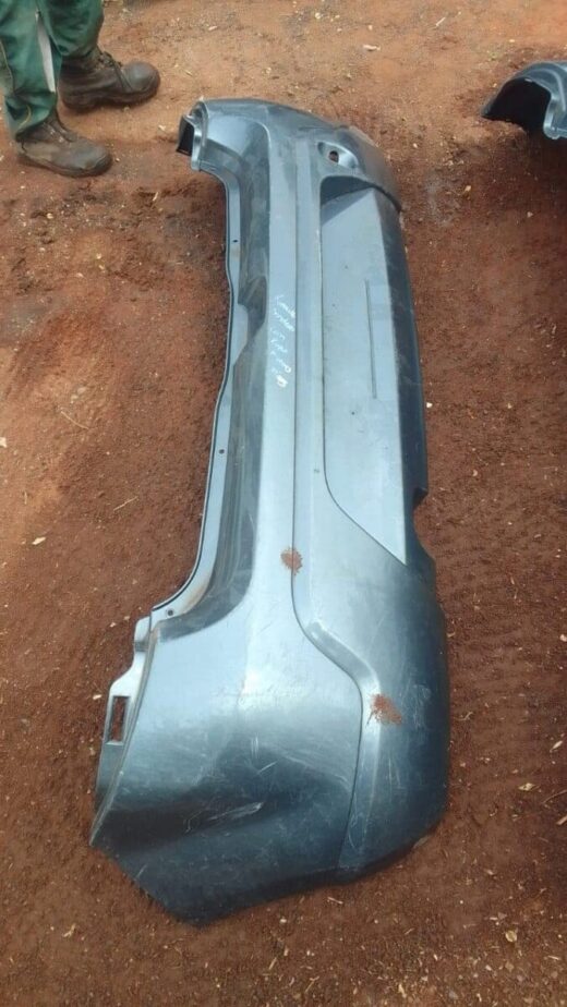 2012 Renault Sandero Rear Bumper - Used Rear view of a used Renault Sandero rear bumper displayed against a plain background.Rear view of a used Renau