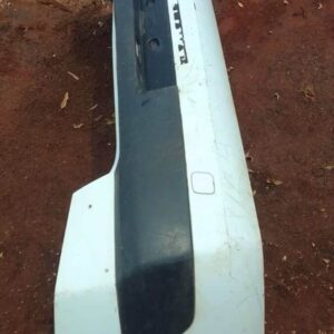 Rear view of used Renault Megane rear bumper showing mounting points and curves on a white background.Rear vie