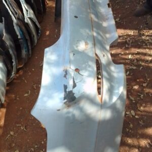 Rear bumper for BMW E60 shown from the back, used condition with mounting points visible.Rear bumper for BMW E