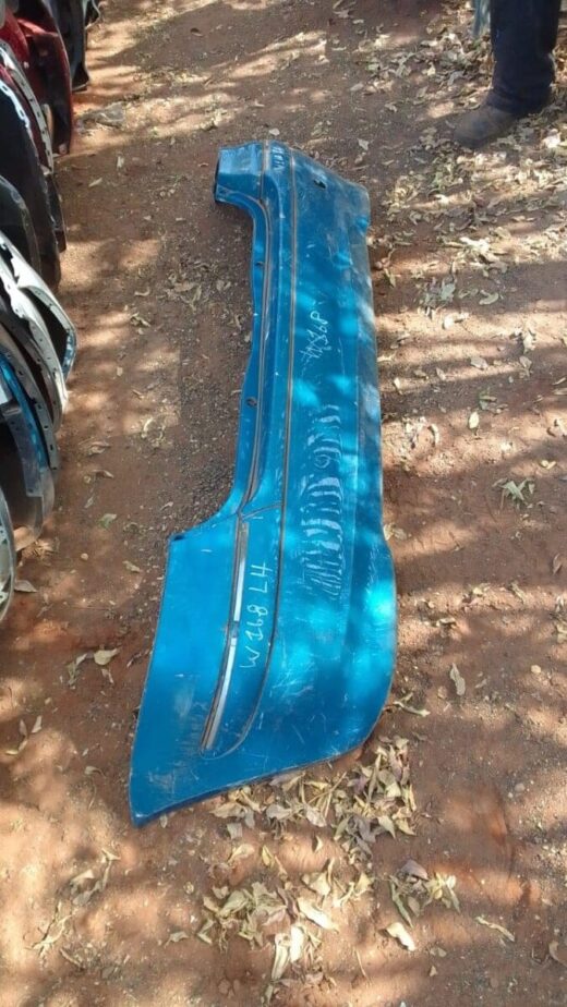 2004 Mercedes W168 Rear Bumper - Used Rear view of a used Mercedes W168 rear bumper, showing mounting points and overall shape.Rear view of a used M