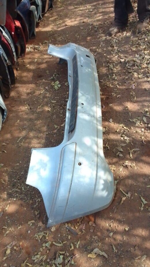 2005 Mercedes W160 Rear Bumper - Used Rear view of a used rear bumper for a 2005 Mercedes W160, showing bumper curvature and mounting points.Rear vi