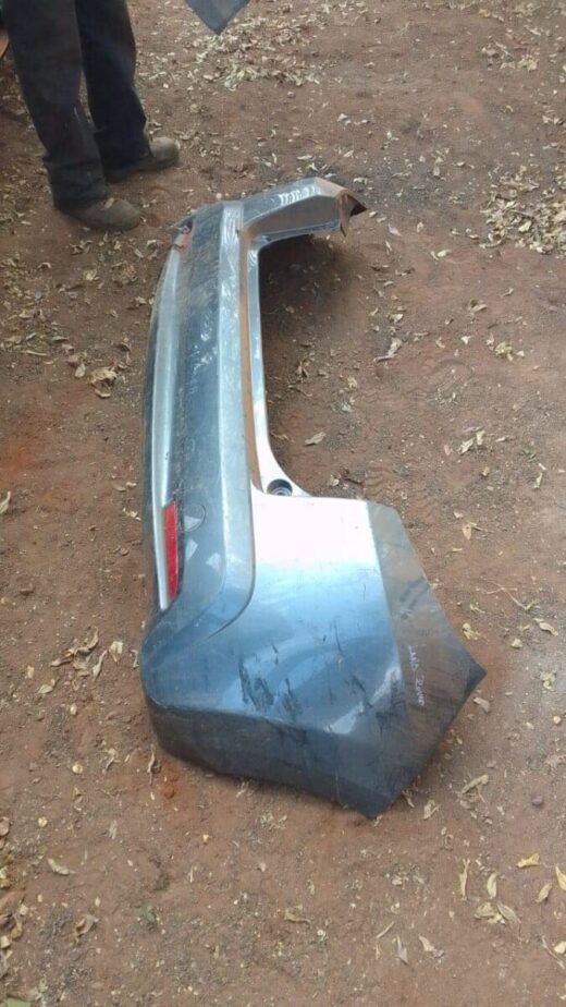 2013 Honda Jazz Rear Bumper - Used Rear bumper of a 2013 Honda Jazz shown from an angled side view, used condition.Rear bumper of a 2013 Honda Ja