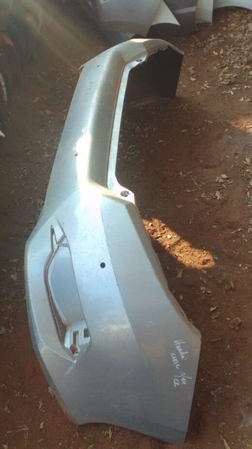 2017 Honda Civic Rear Bumper - Used Rear bumper of a 2017 Honda Civic shown head-on, used condition with minor scuffs and mounting points visible.