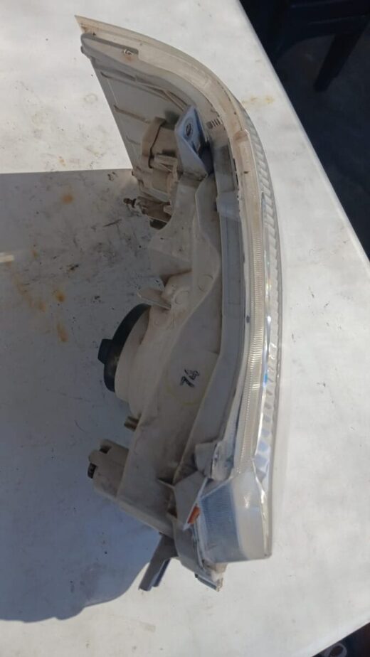 Used OEM Toyota Quantum Left Headlight – front view