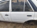 Mazda 323 Sedan Left Rear Door Shell Used – Genuine OEM Mazda Door Panel