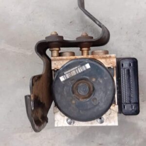 Used ABS pump for Dodge Calibre / Jeep Cherokee — bench-tested, photographed (left side view)